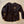 Black long-sleeve shirt with a logo on a beige surface